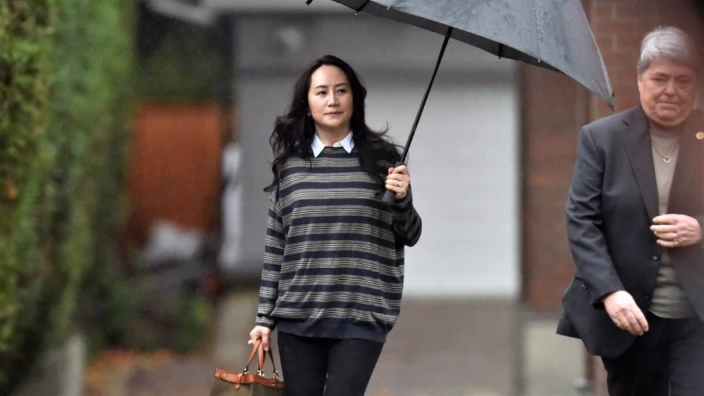 Huawei Technologies CFO Meng Wanzhou leaves her home to attend a court hearing in Vancouver on Nov. 23. © Reuters