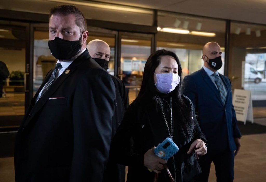 Meng-Wanzhou-exits-Supreme-Court-after-a-hearing-in-Vancouver-British-Columbia-Canada-on-Jan.-29.-Photographer-Darryl-Dyck-Bloomberg